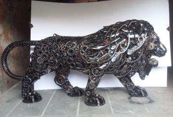 A lion made out of scrap waste