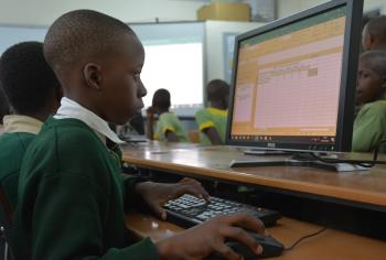 A boy using a computer