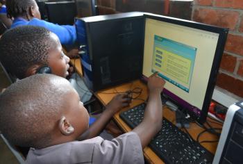 Two students using a computer
