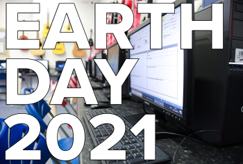 Text: Earth Day 2021 Image: A Computer in a classroom