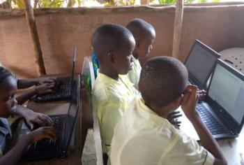 A group of students using laptops