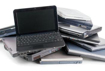 Stack of unwanted laptops.
