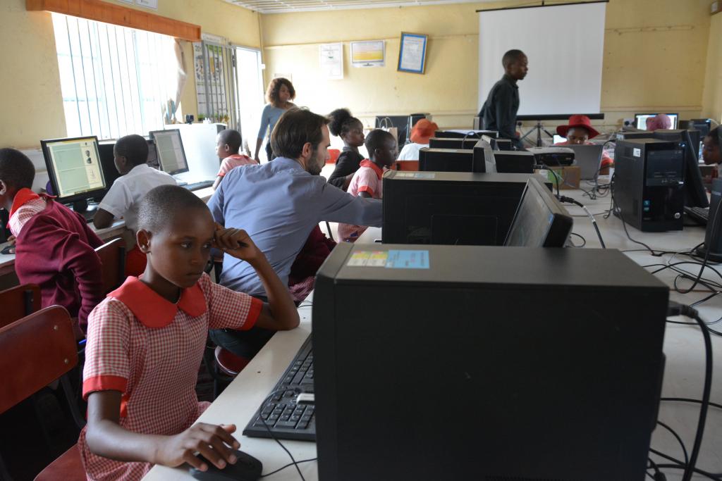 An IT lab with students working on computers