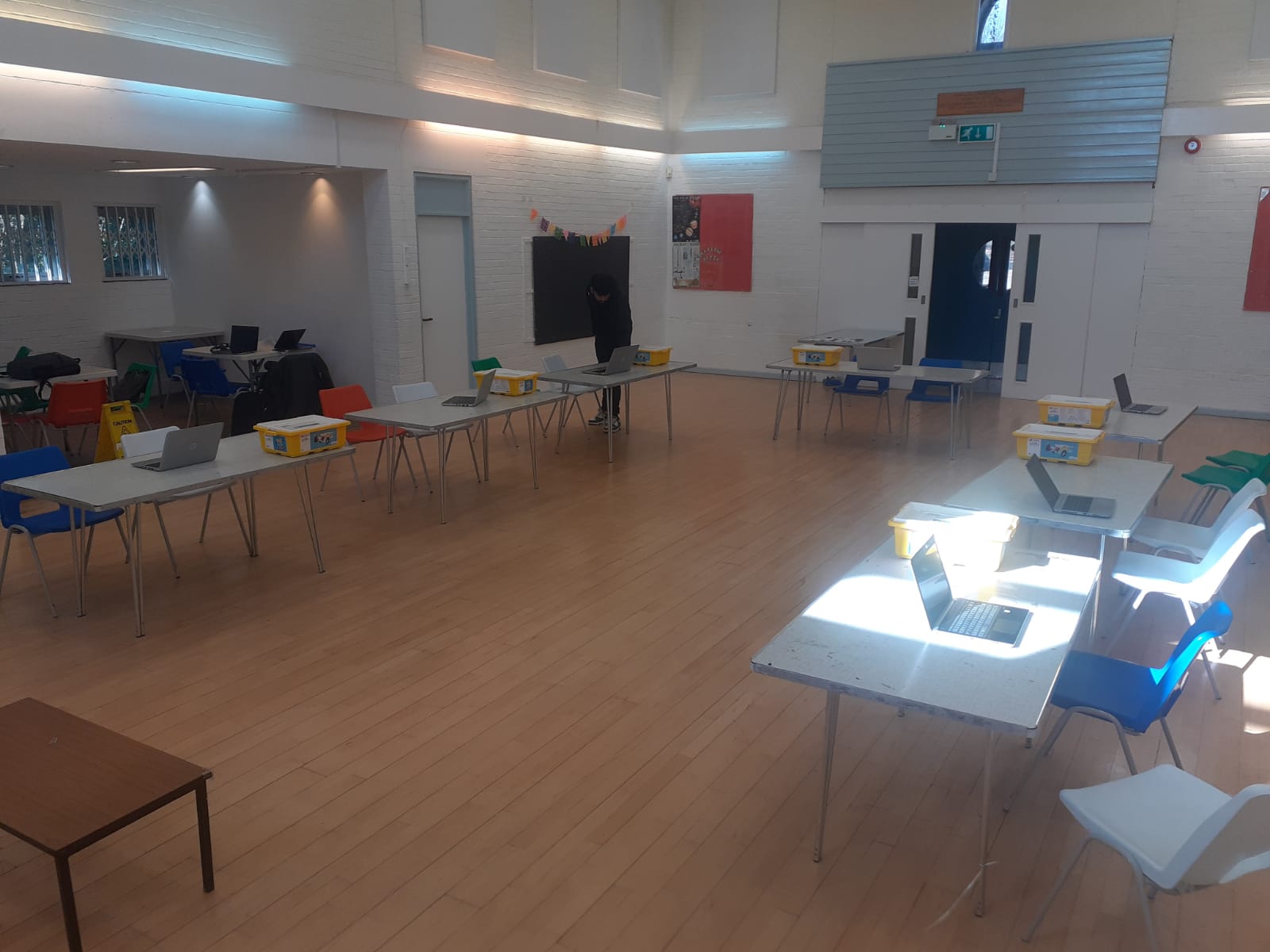 Lego robotics class with supplied laptops, empowering students